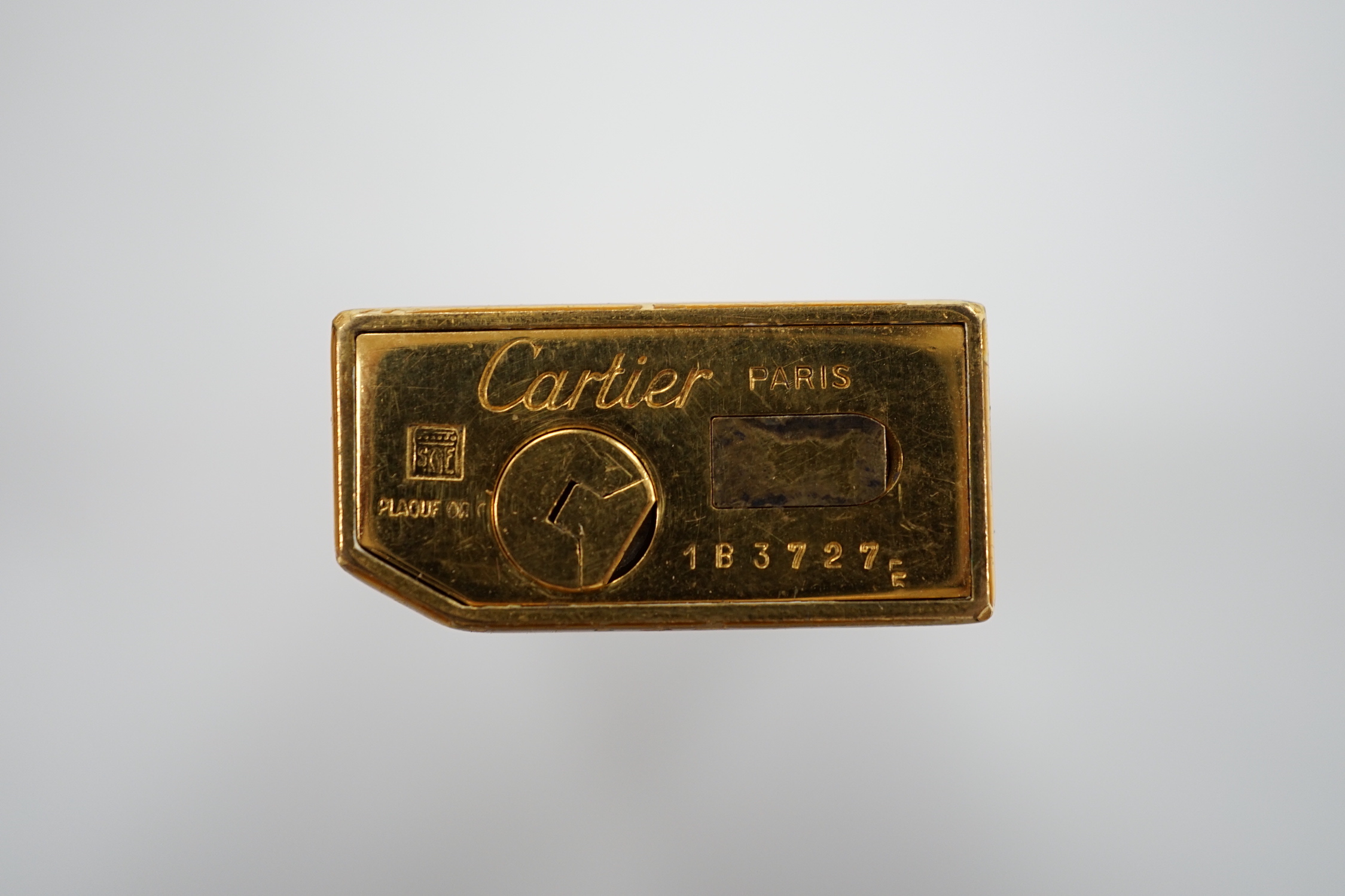 A cased Cartier cigarette lighter